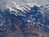 Shishapangma 02 02 Nasa ISS008-E-6355 From West Nasa ISS008-E-6355 was taken on 2003-11-28 from the east. Shishapangma is in the lower centre. The valley towards Nyalam goes up in the left. The valley from Nyalam to the Southwest face goes from left to right in the centre, with Jugal Himal mountains Phurbi Ghyachu (6658m) and Lenpo Gang (Big White Peak 7083m) at the beginning of the valley.